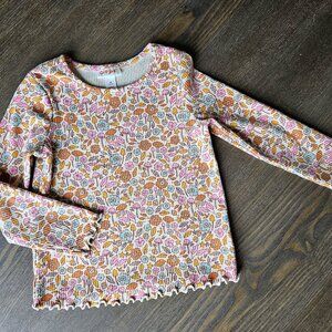 Two floral long sleeve shirts